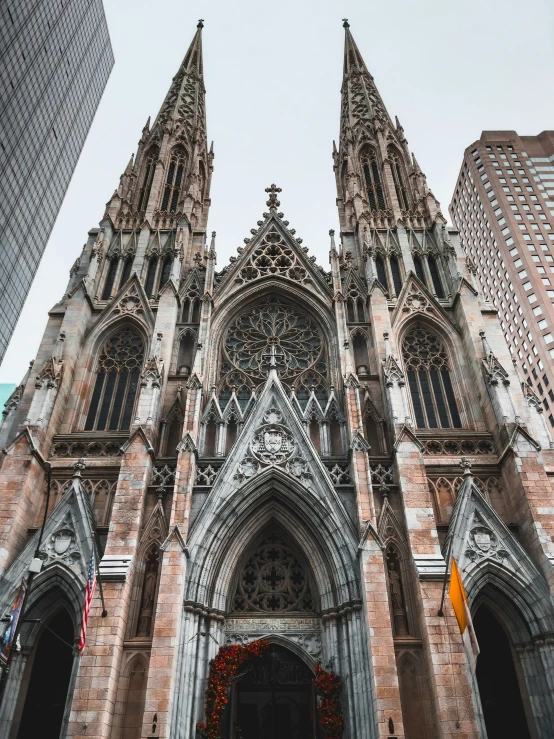 large building made up of stone with two tall towers