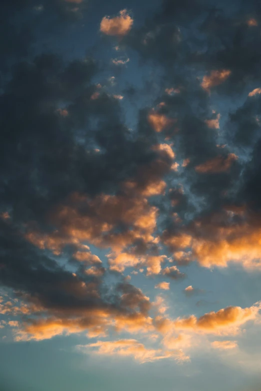 the plane is flying at very high speed under the sunset