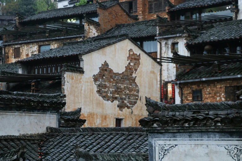 a clock on the side of a large building