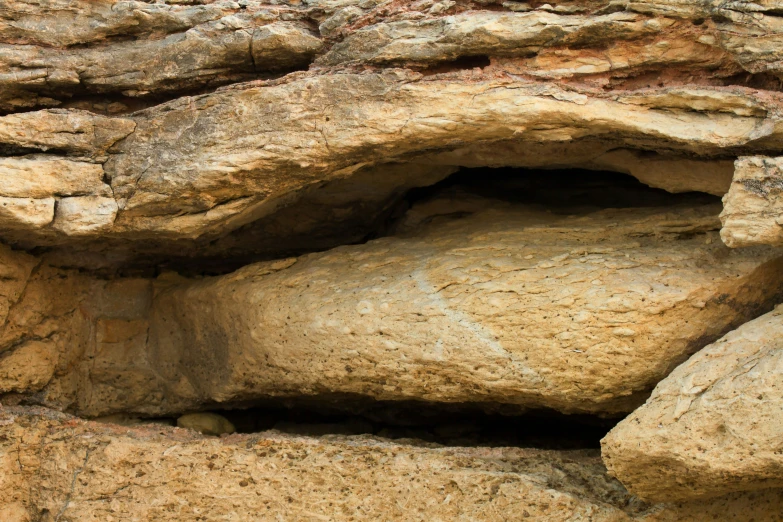 a rocky area with some rocks under it