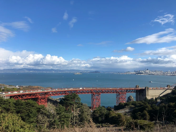 an image of a bridge over water in a city