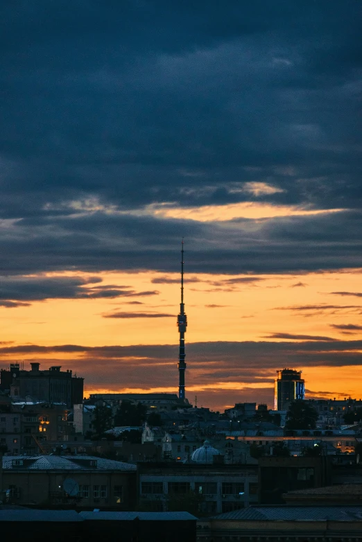 cityscape with buildings and the sky at sunset