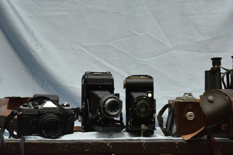 a bunch of different camera and other items