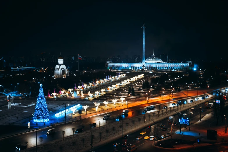 an aerial view of a very large city in the dark