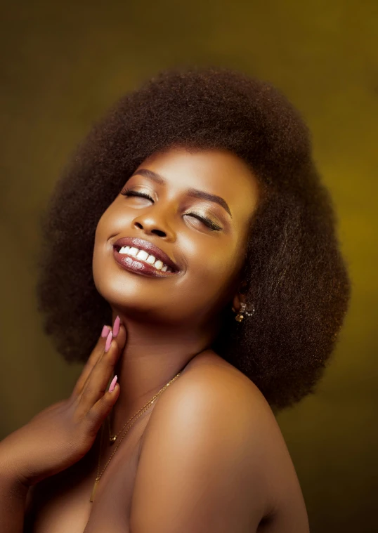 an african woman wearing jewelry and smiling