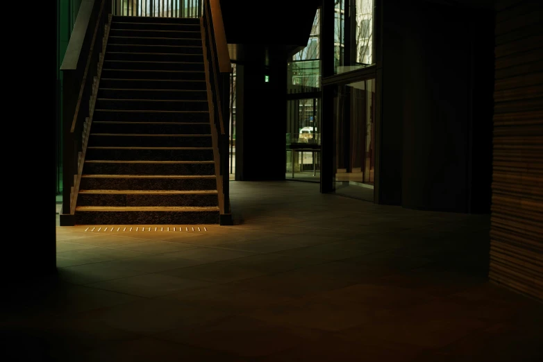 a group of stairs leading up to a lobby