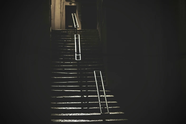 a staircase going up into a building from the stairs are drawn in white with black stripes on it