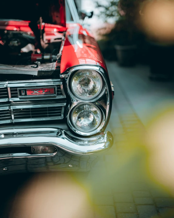 the front bumper of a classic car is shown