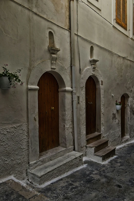 the narrow streets have steps leading to doorways