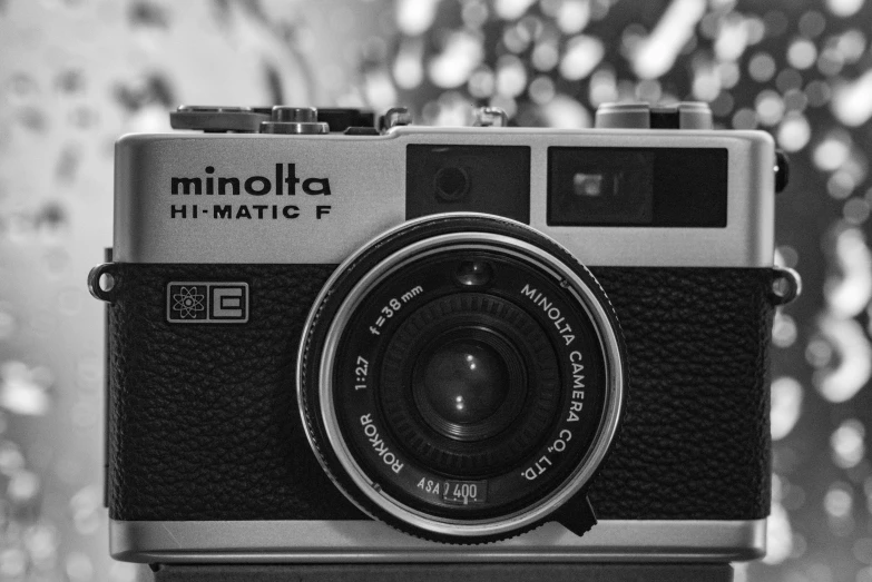 a black and white po of an old camera