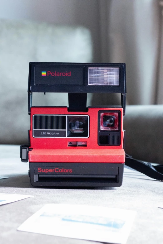 an old video camera on top of a table