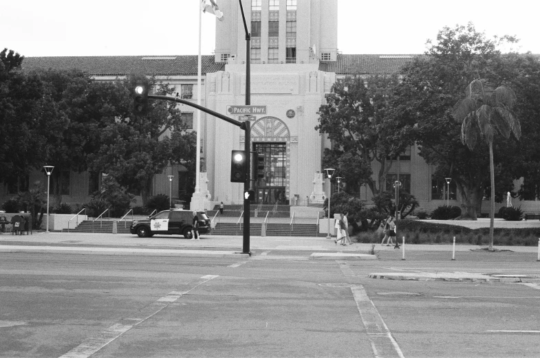 a large white building with a clock tower