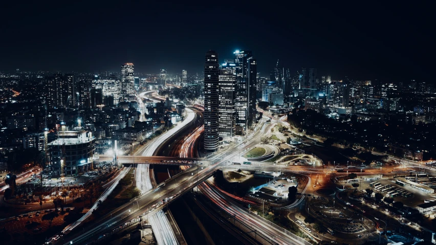 an aerial view of city streets at night