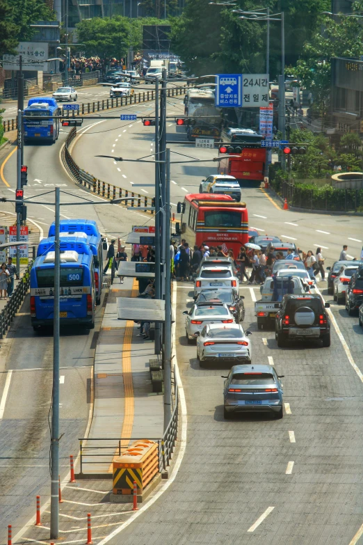 a group of cars driving on top of a road