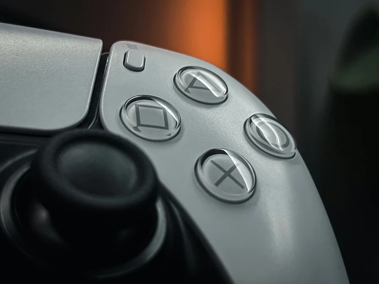 a close up s of a gray controller