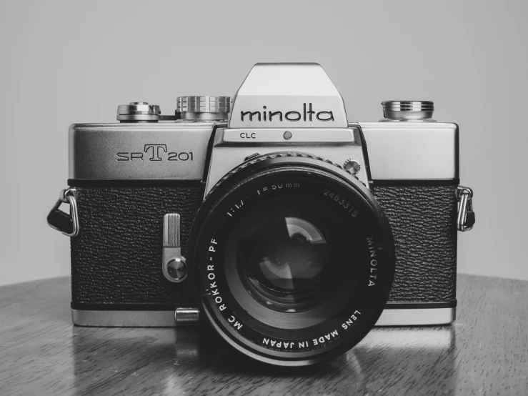 a small analog camera on top of a table