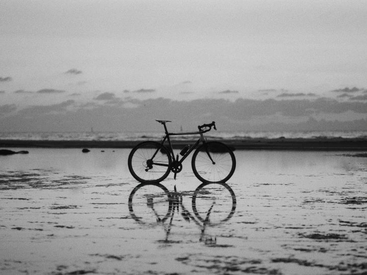 a bicycle that is sitting in some water