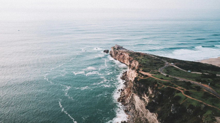 the coast and cliffs of the shoreline at the ocean