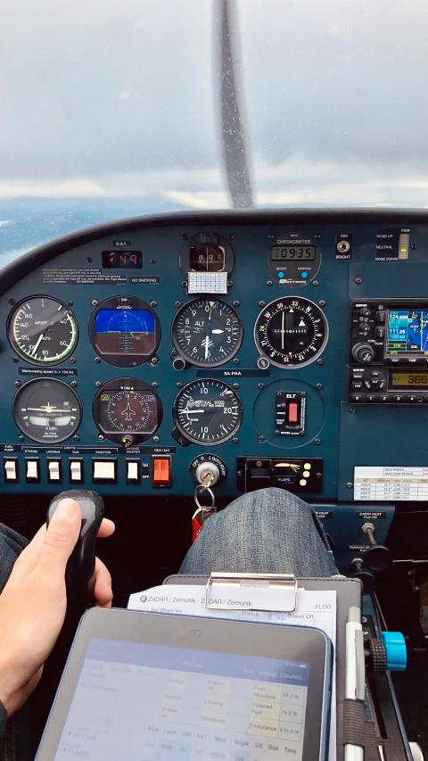 the controls and instruments on an airplane, as seen from the cockpit