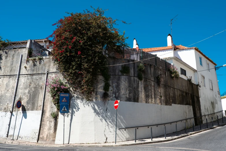 an old building with ivy on the outside wall