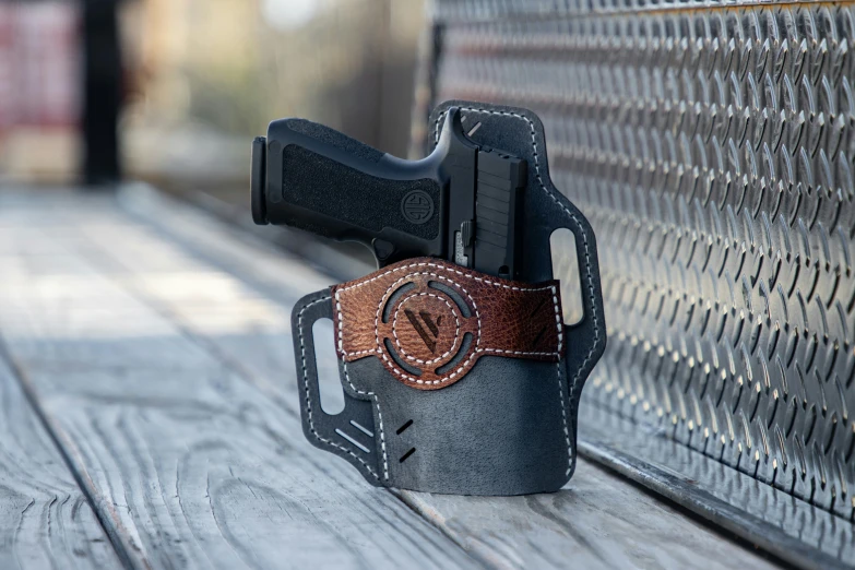 the concealed holster sits next to a wall