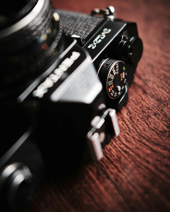 a close up of a camera on top of a table