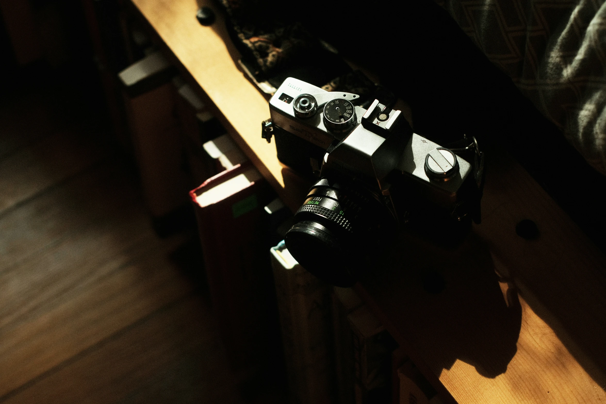 a camera is shown on a table with other items