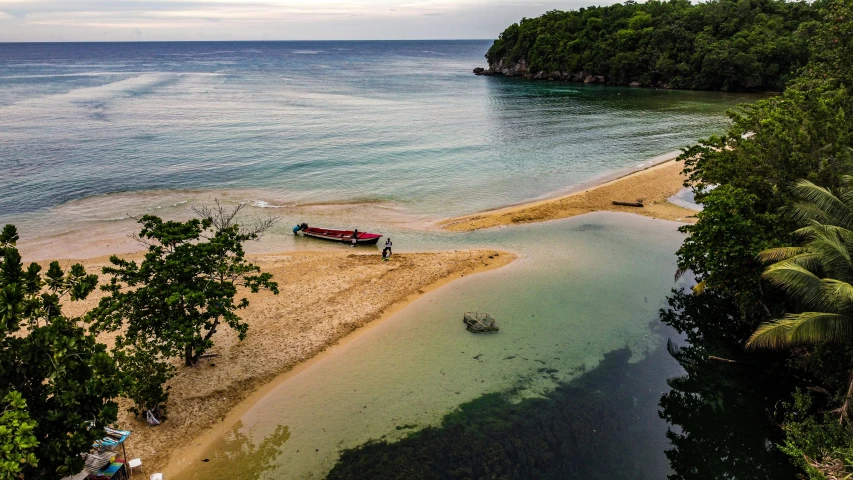 the boat is tied up on the shoreline of an island