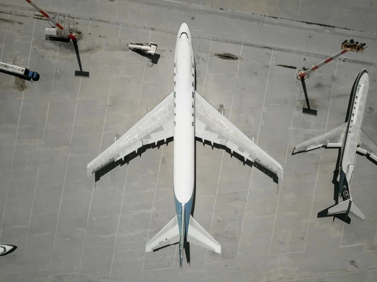 this is an overhead view of an airplane in a hanger
