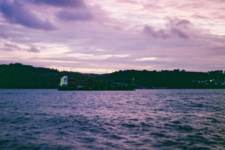 boat in the water at dusk on a lake