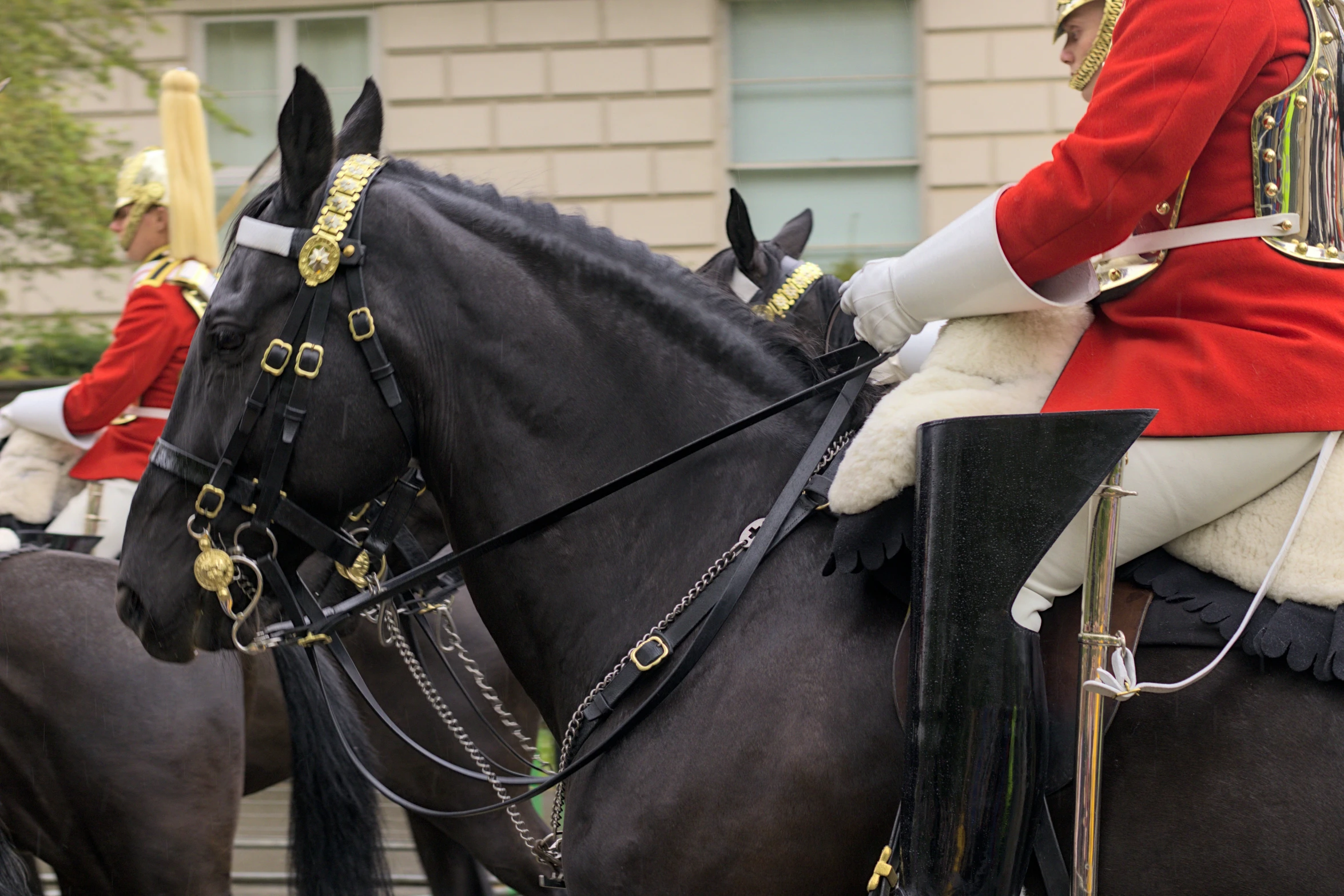 there are some men in the uniform on horses