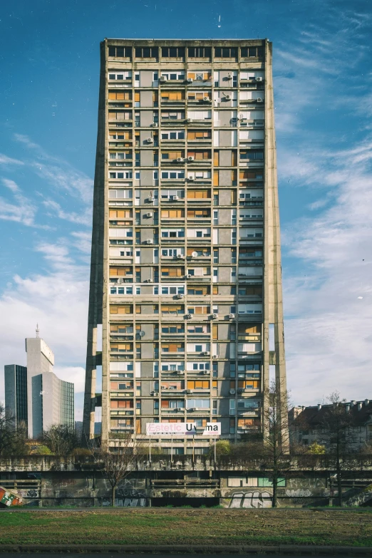 an unusual building in the city that has been built in the shape of a tower