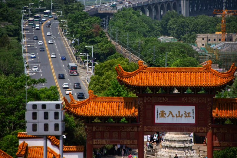 a traffic jam passes over the chinese gate