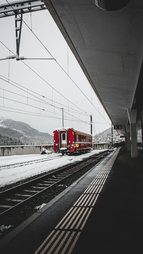 an open train station with a long red box