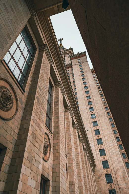 looking up at an upper story building with windows