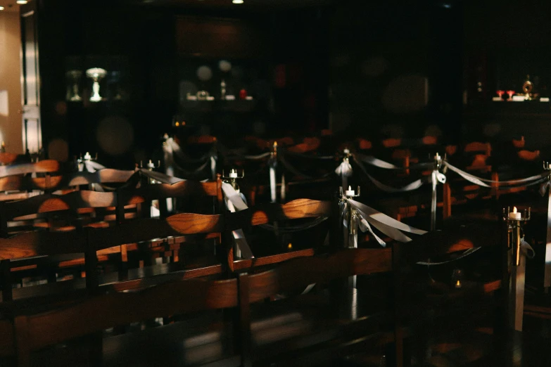 chairs are lined up in the corner of a room