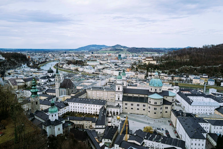 an aerial view of a large city with a river running through it