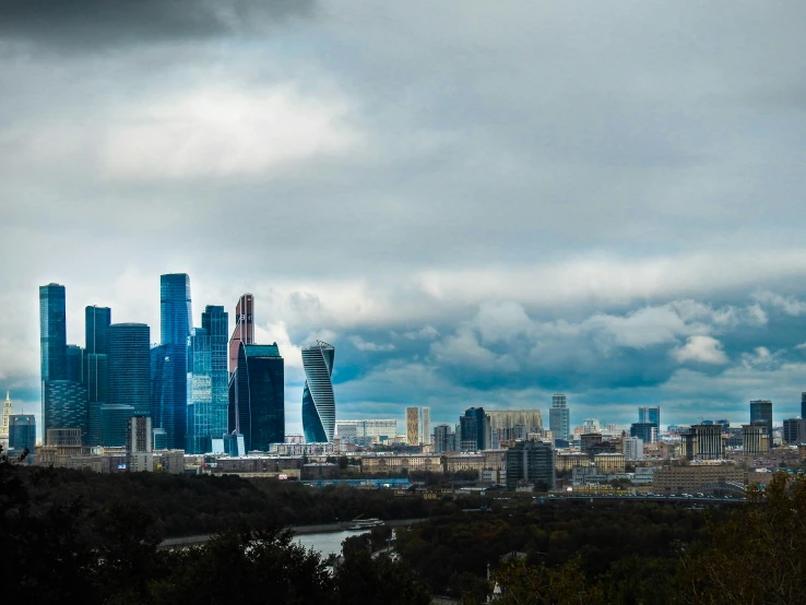 the city skyline has a dark grey background