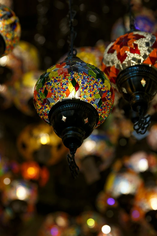 chandeliers made out of multi colored mosaic glass