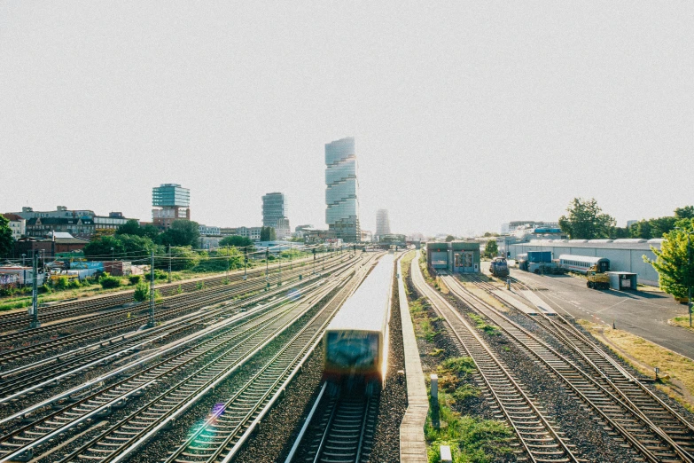 this is an image of the city and train tracks