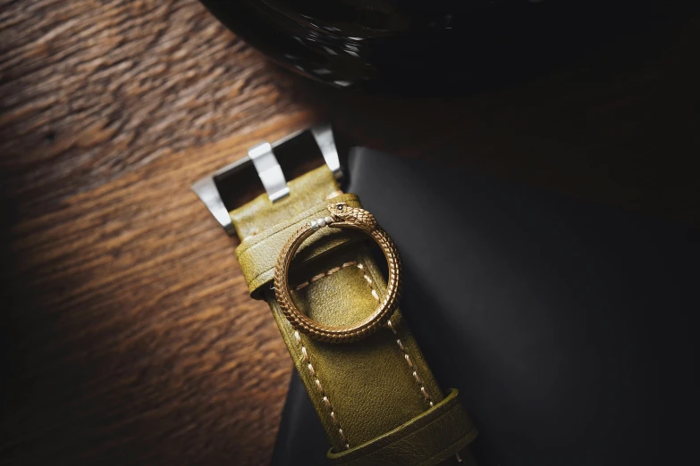 a very cute watch on a piece of leather