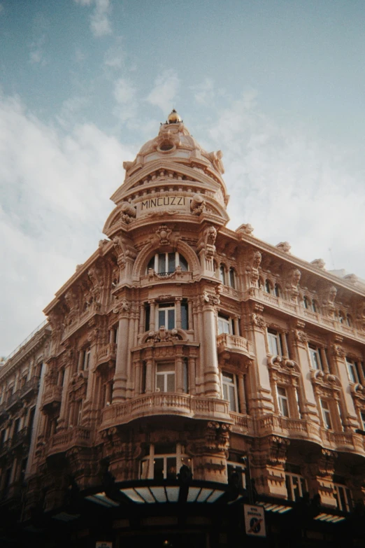 large building with elaborate windows and the sky