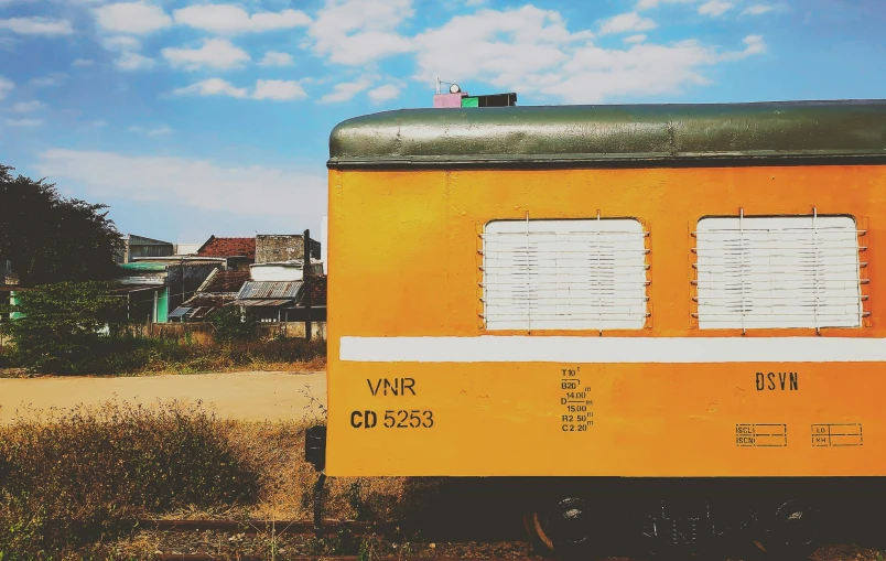 a old train caboose in a rural setting