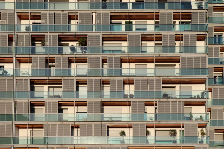 some buildings with a bunch of balconies on them