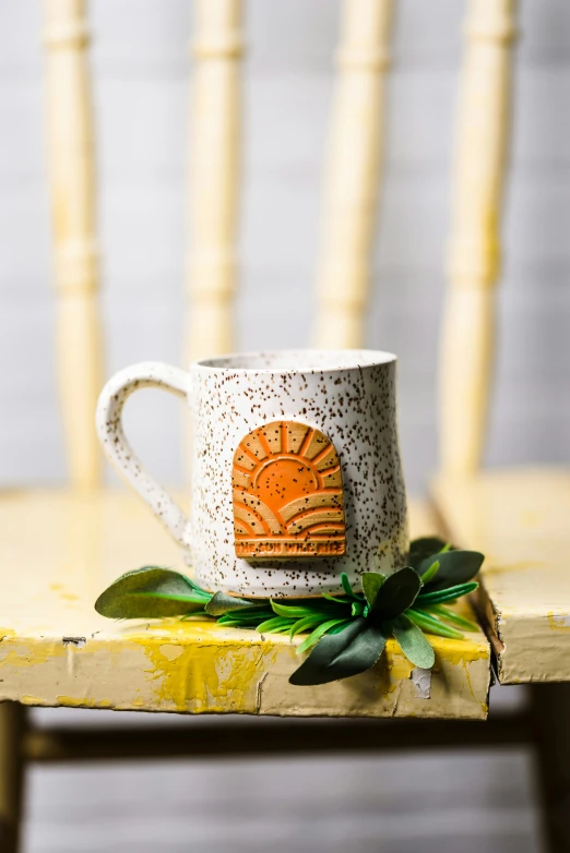 a close up of a coffee cup on a table