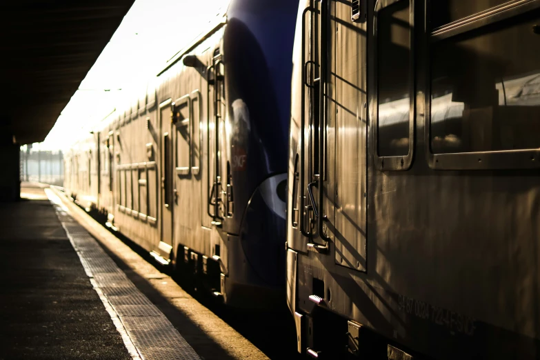 the shadow is cast from the side of a train