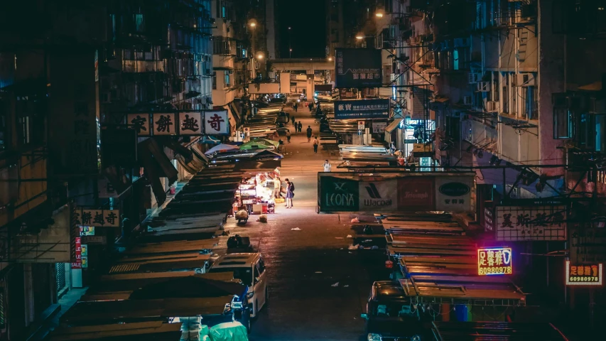 an alley in an oriental city at night time