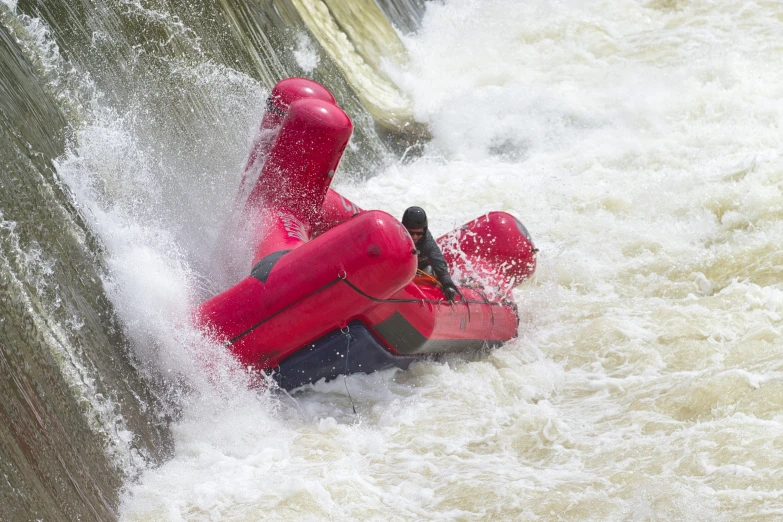 the raft is being lowered into the current