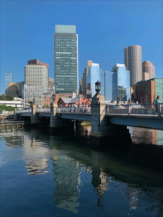 an image of a city skyline taken from a boat on the river