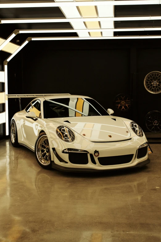 a sports car is parked in a showroom